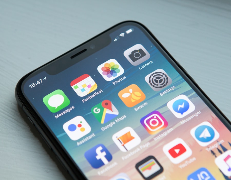 A smartphone home screen full of apps